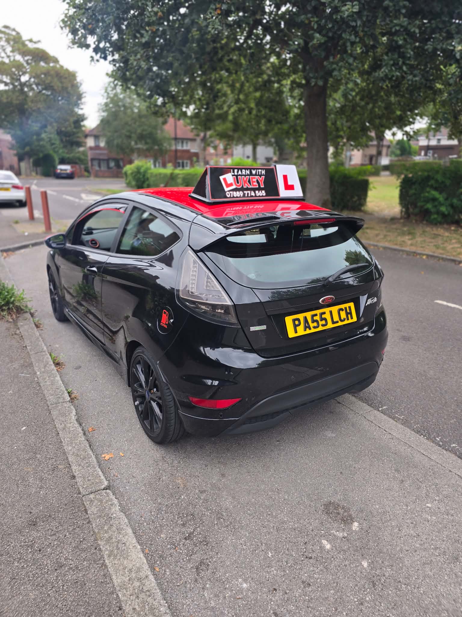Learn With Lukey manual learner car parked on a residential street