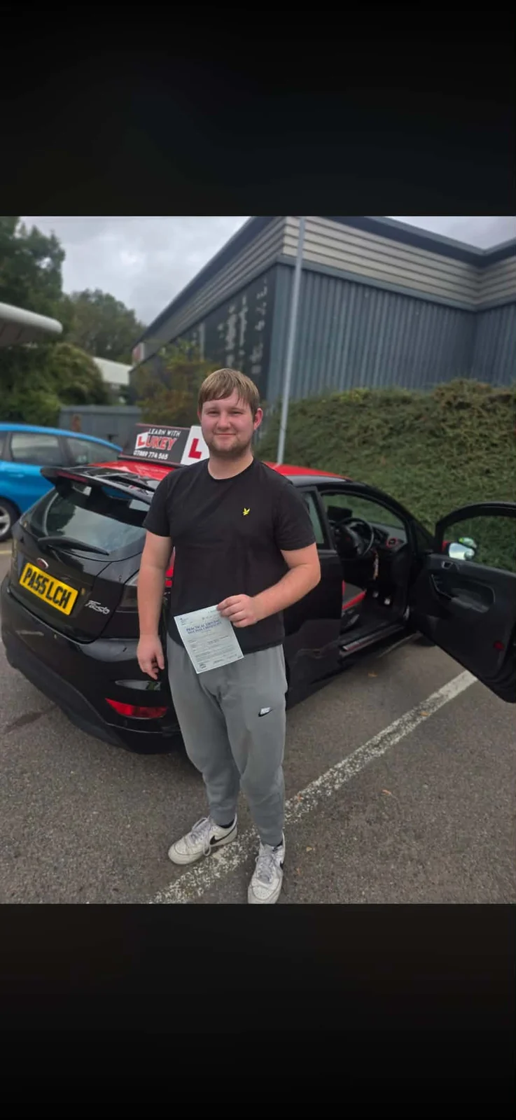Ethan celebrating a driving test pass at Rotherham Test Centre
