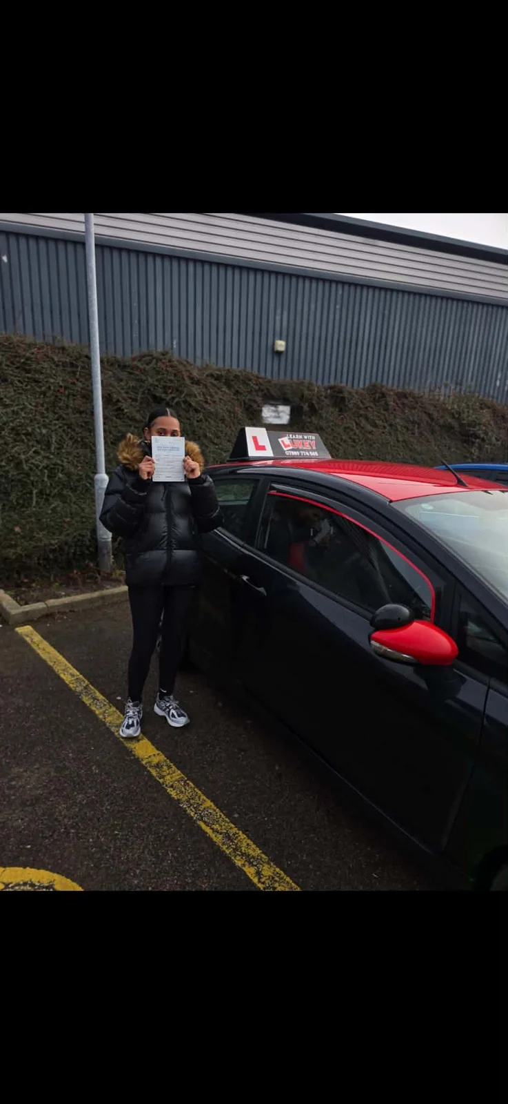 Nay celebrating a first-time driving test pass at Rotherham Test Centre